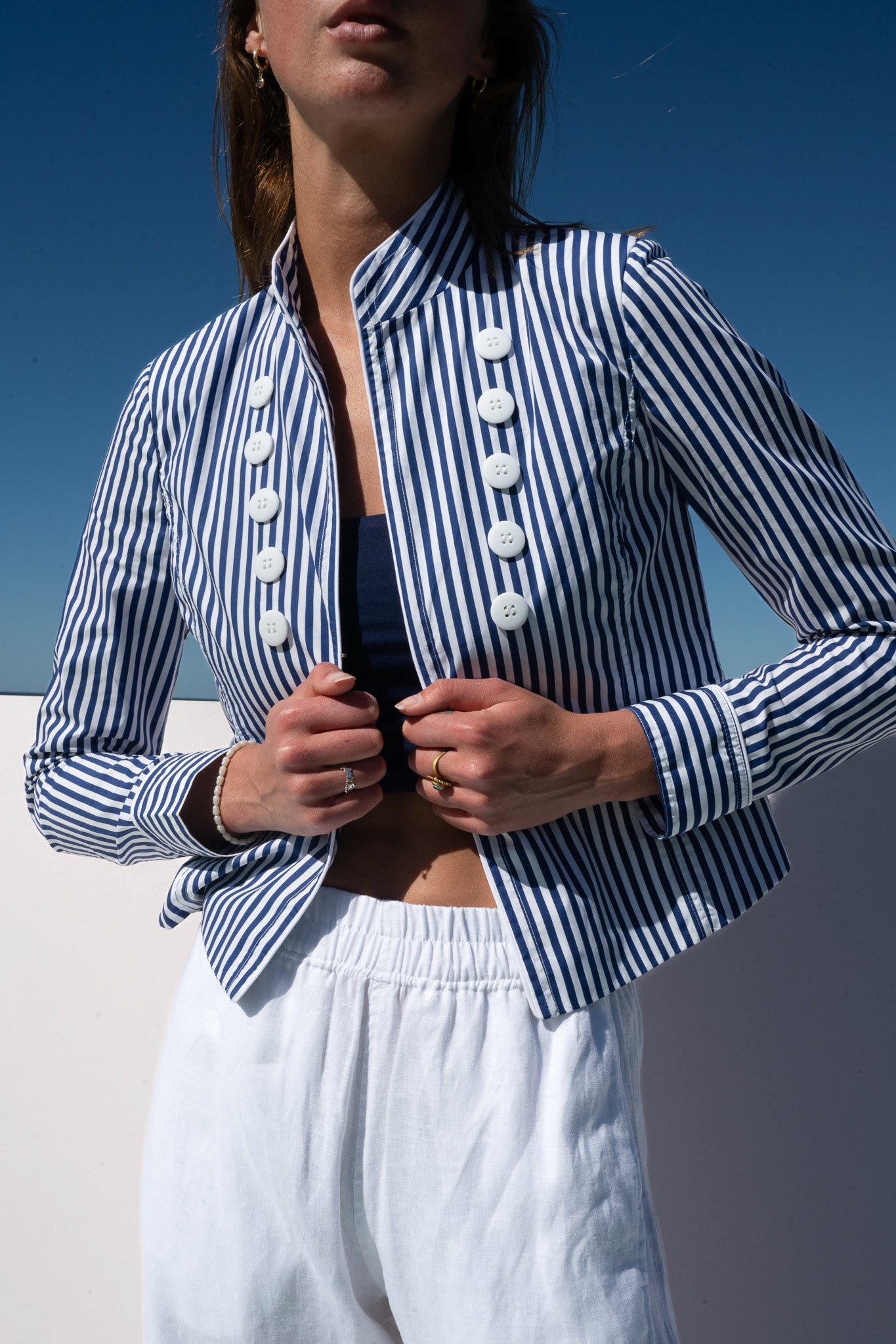 Close-up of azure stripe Abbey Road Jacket highlighting oversized white buttons