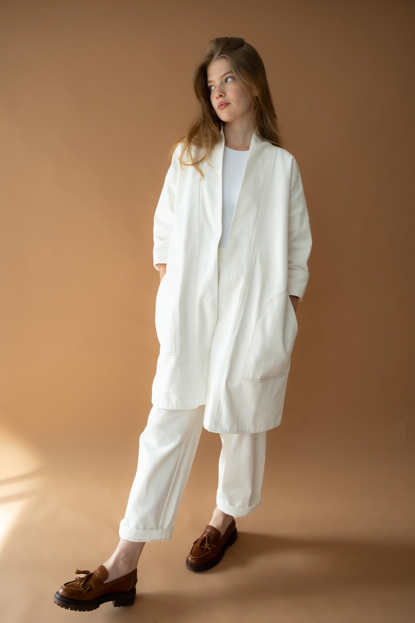 Model wearing The Boy & I Blaze Jogger paired with matching ivory Yoko Kimono Jacket and brown loafers, full outfit view