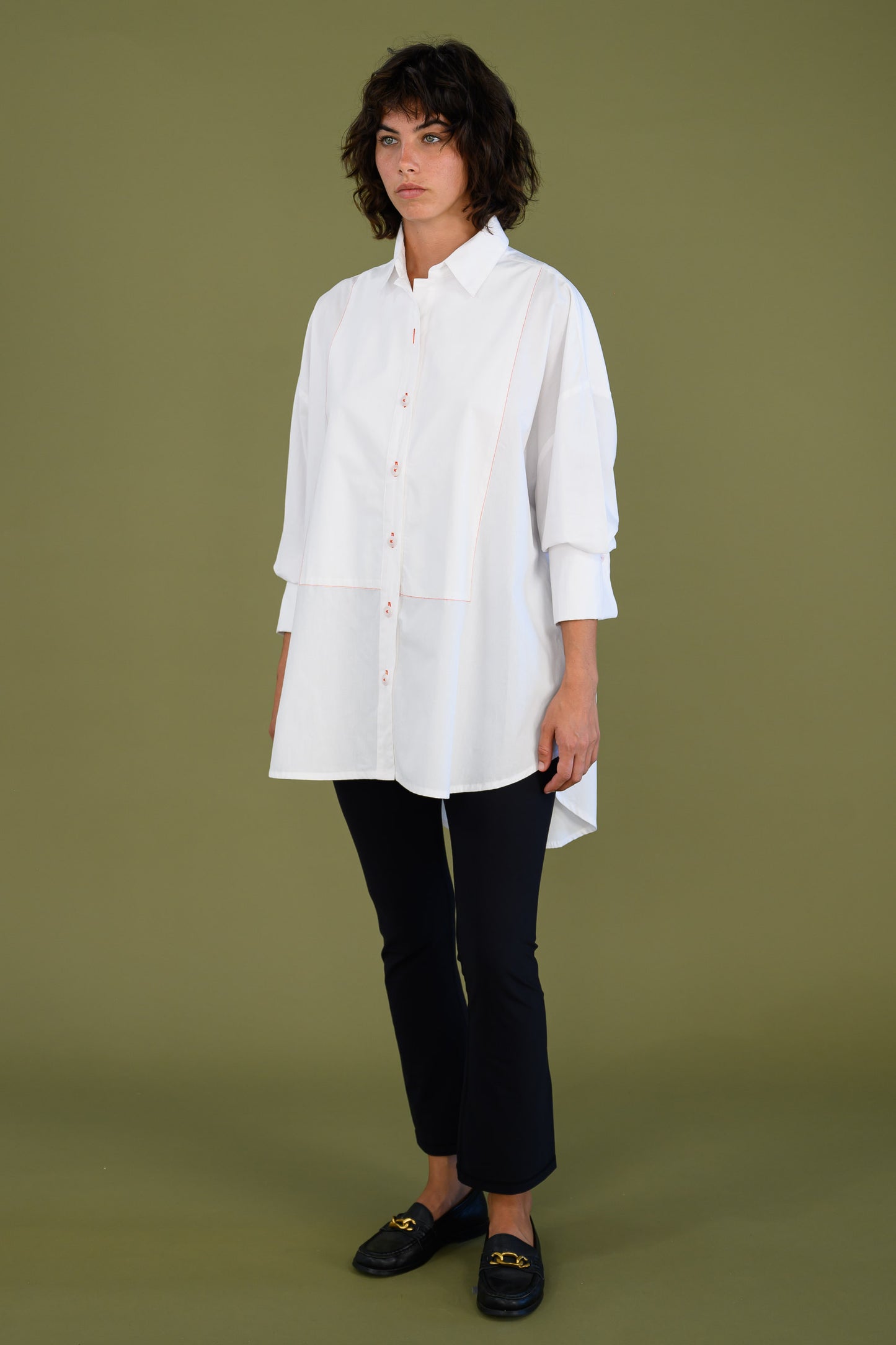 Womens oversized white boyfriend tux shirt in organic cotton poplin styled with slim black pants for a relaxed everyday outfit