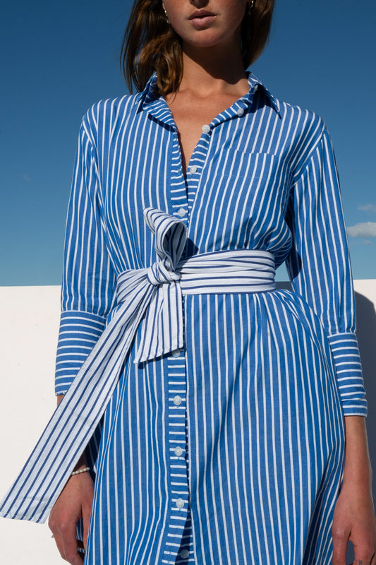 Front view of The Boy & I Bronte Dress in blue and white pinstripe with contrast waist tie bow