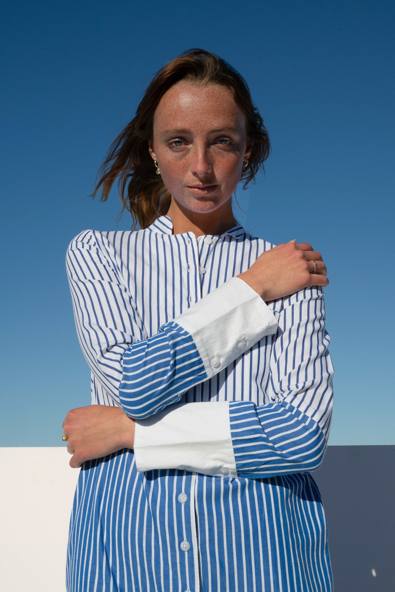 Close-up of the Sisto Dress front bodice with mandarin collar and stripe detail