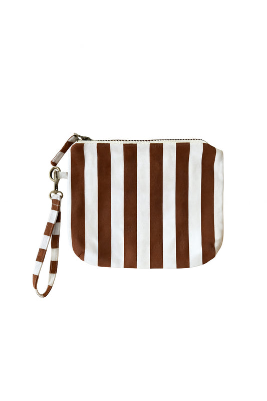 Product shot of a clutch bag in caramel stripe 
