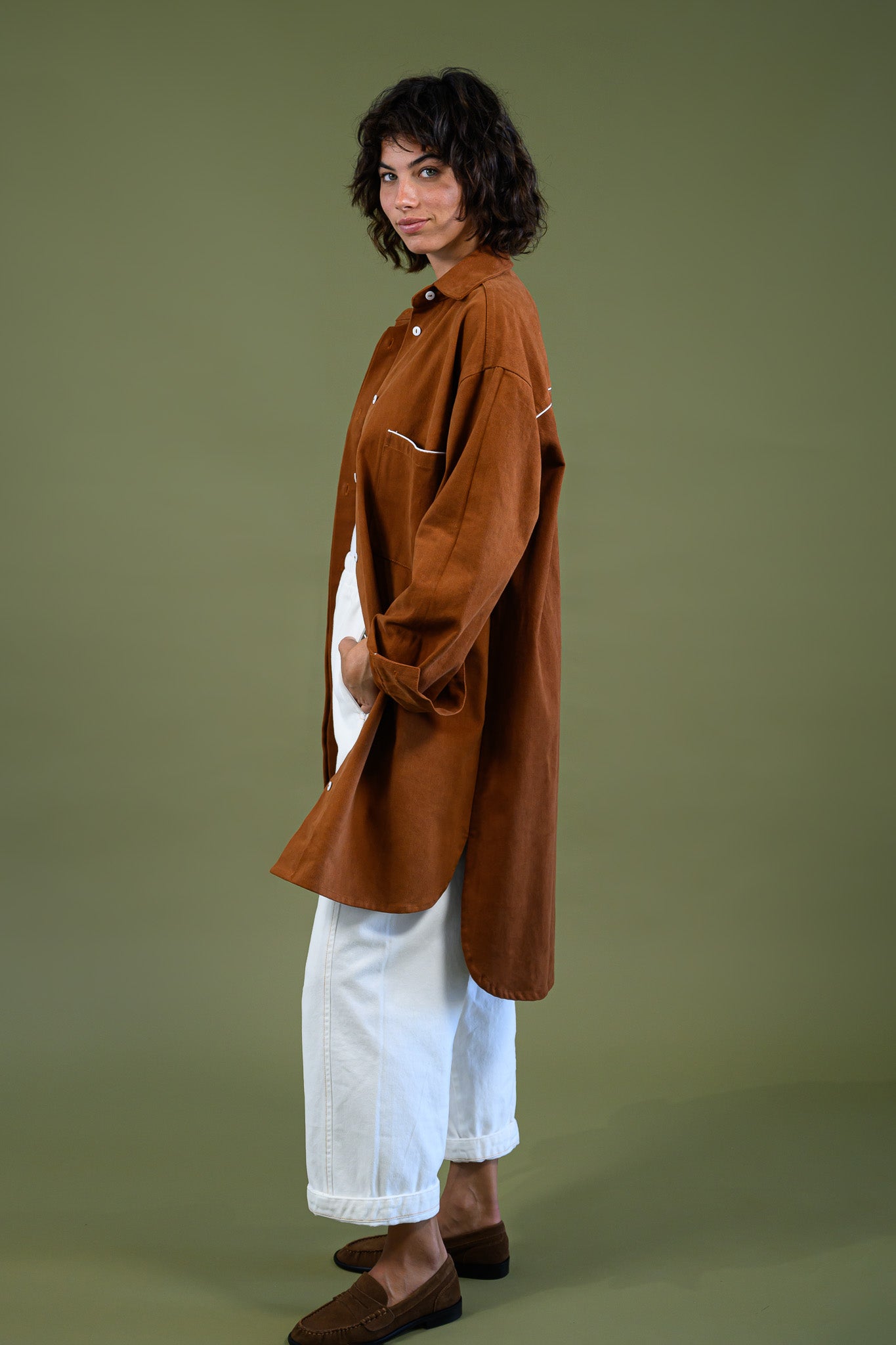 Side view of Caramel cotton canvas denim shirt coat showing relaxed silhouette