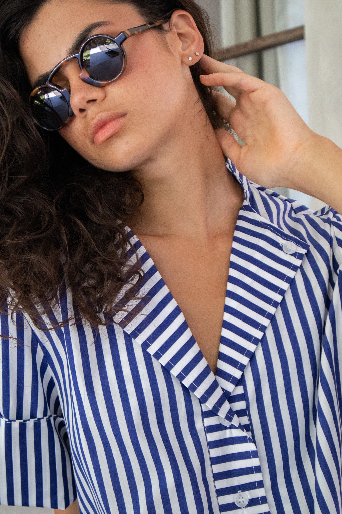 Close up detailed image of a Womens blue and white stripe shirt blouse, Australian made from cotton poplin 