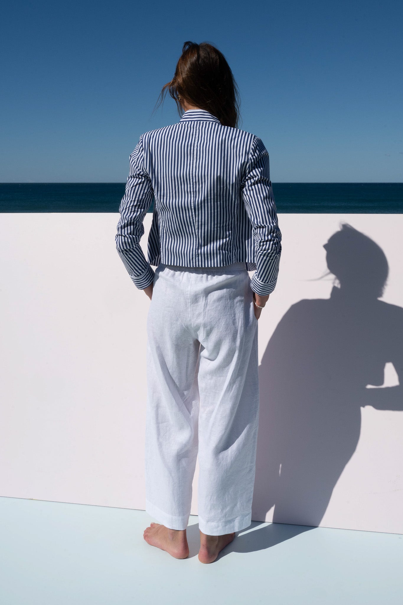 Back view of Abbey Road Jacket in azure stripe cotton poplin with vertical stripe pattern.