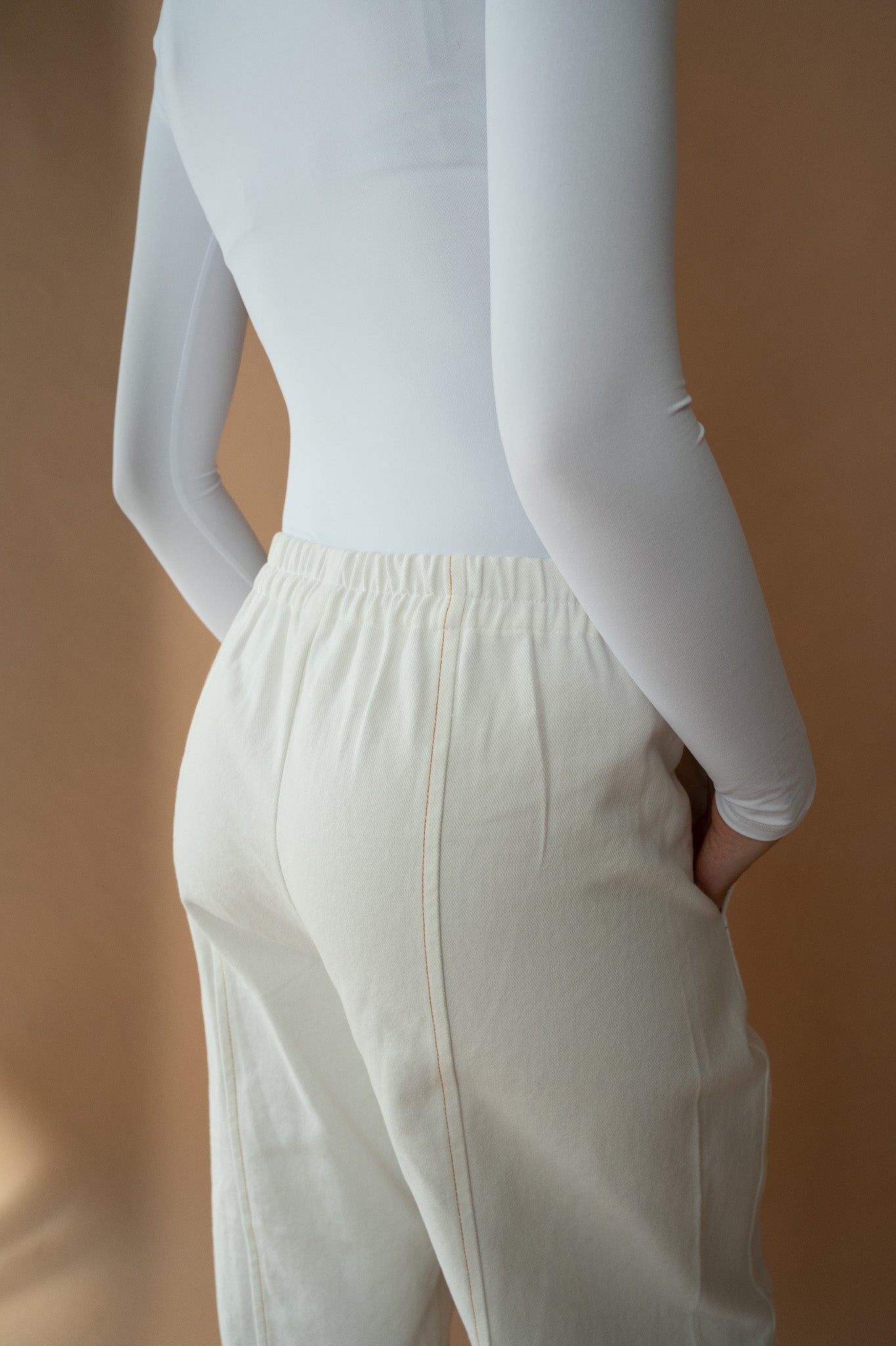 Back view of Blaze Jogger pants from The Boy & I featuring wide elastic waistband and contrast stitching