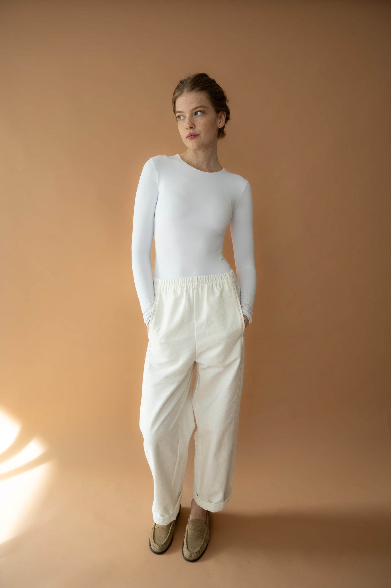 Model facing forward in The Boy & I Blaze Jogger, organic cotton suede twill with casual relaxed fit