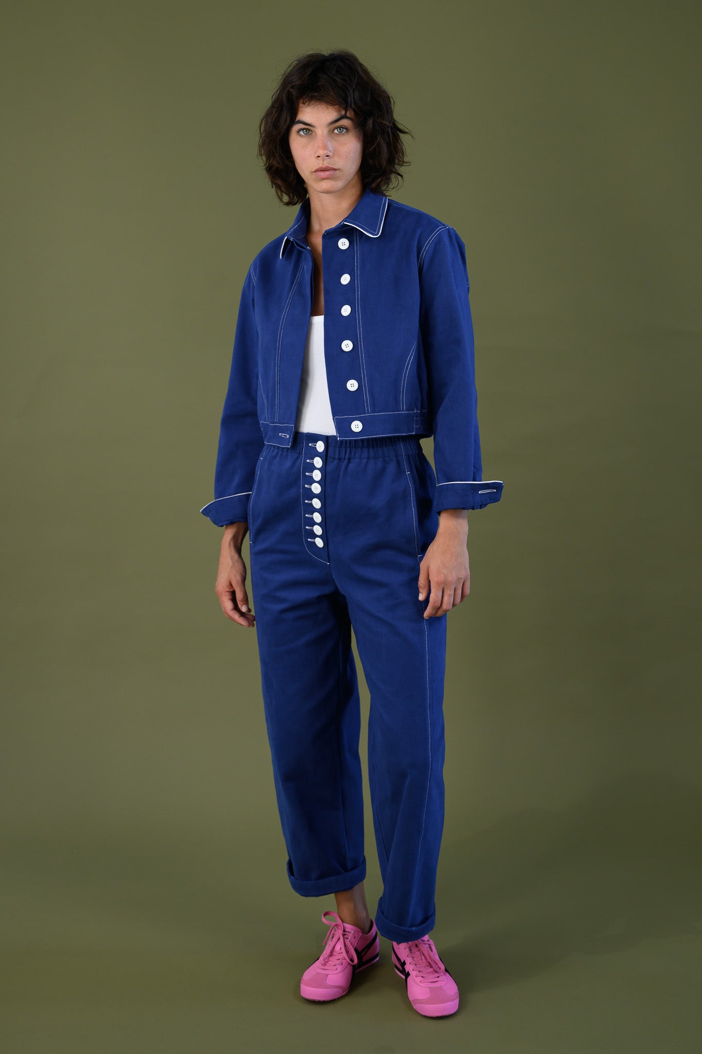 Full length view of blue cotton twill jacket styled with matching pants
