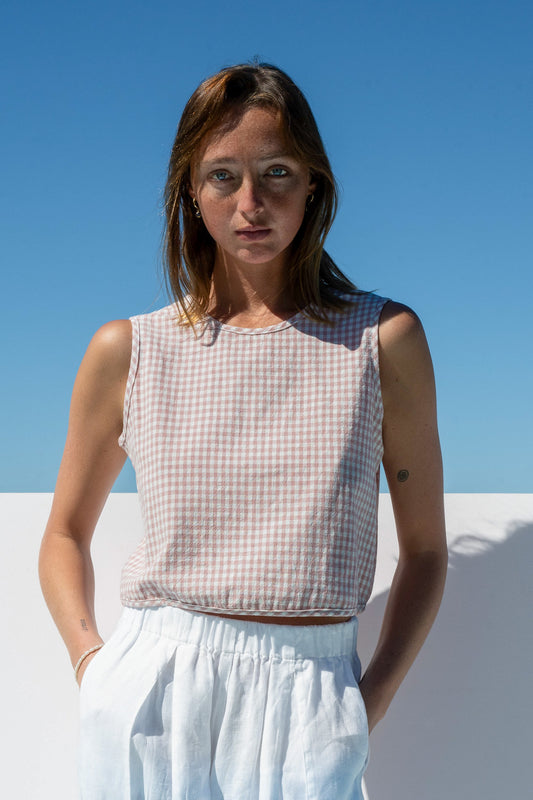 Front styling of The Boy & I Box Crop Top in blush gingham cotton with linen white salt pants