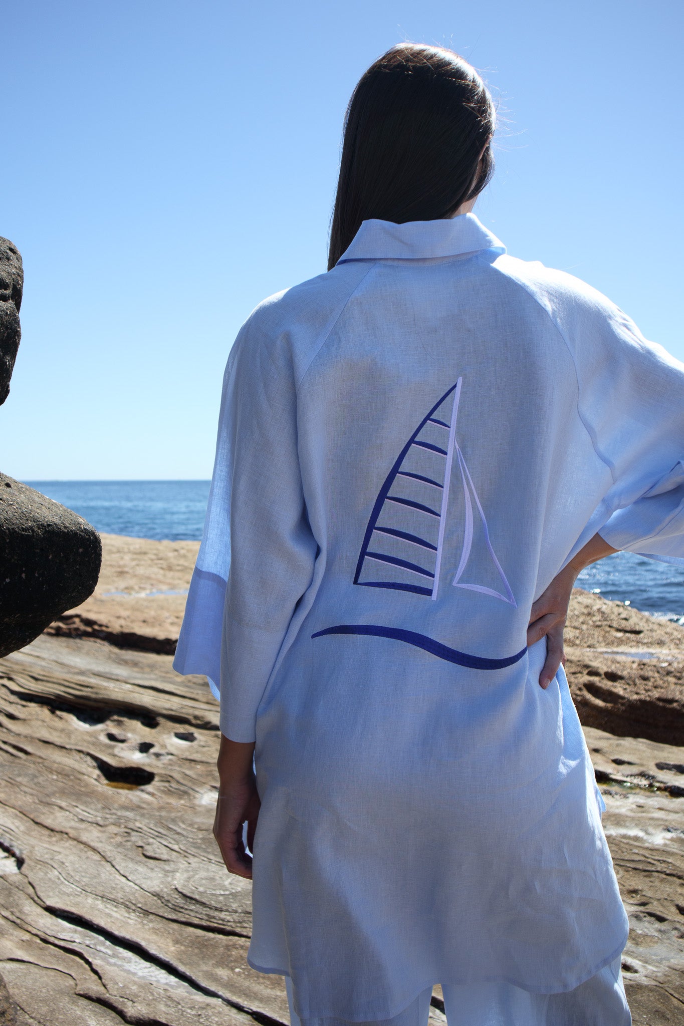 Back view of the Oceanic Shirt in sail boat showing embroidered sail boat artwork