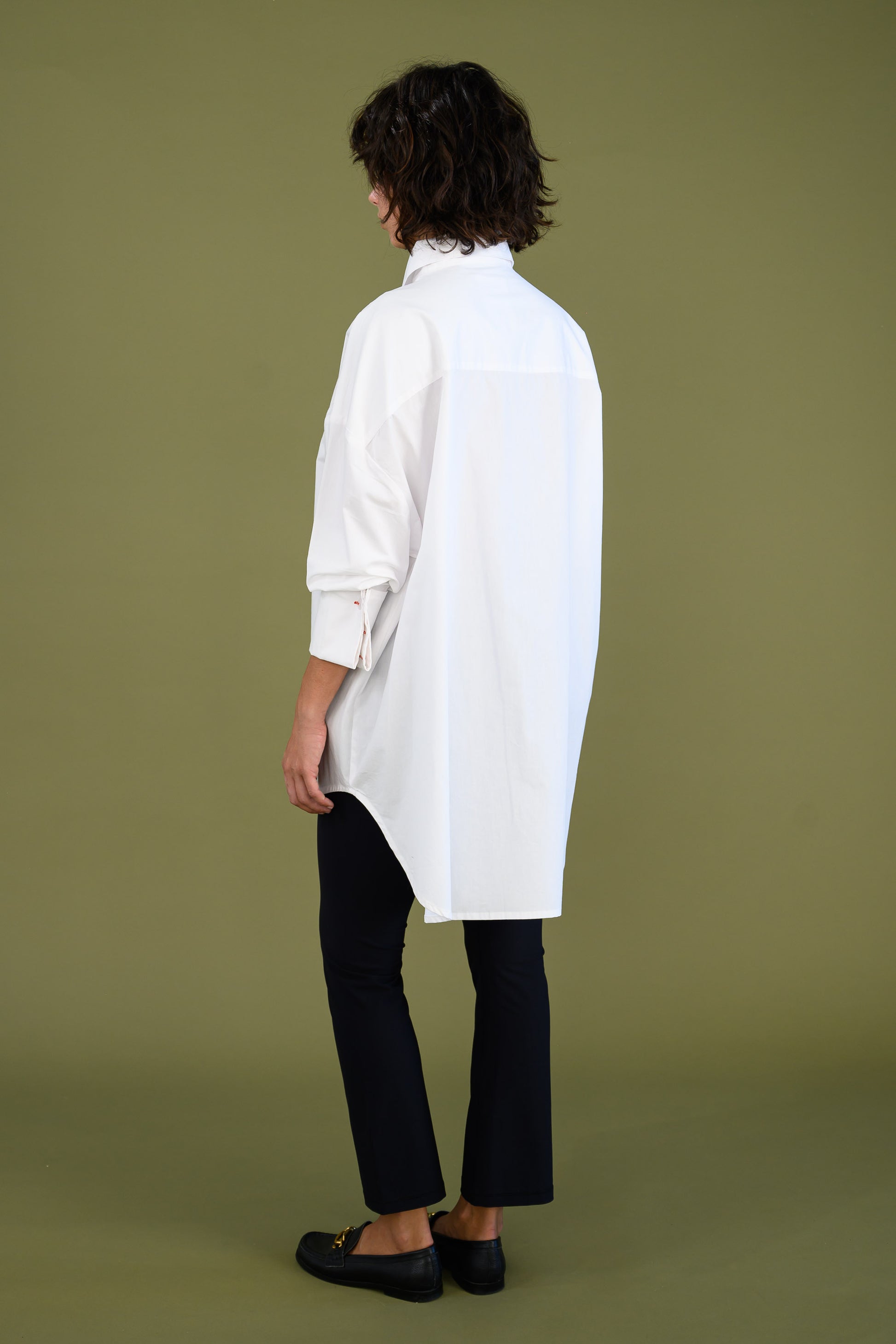 Womens oversized white boyfriend tux shirt in organic cotton poplin back view showing longline relaxed fit