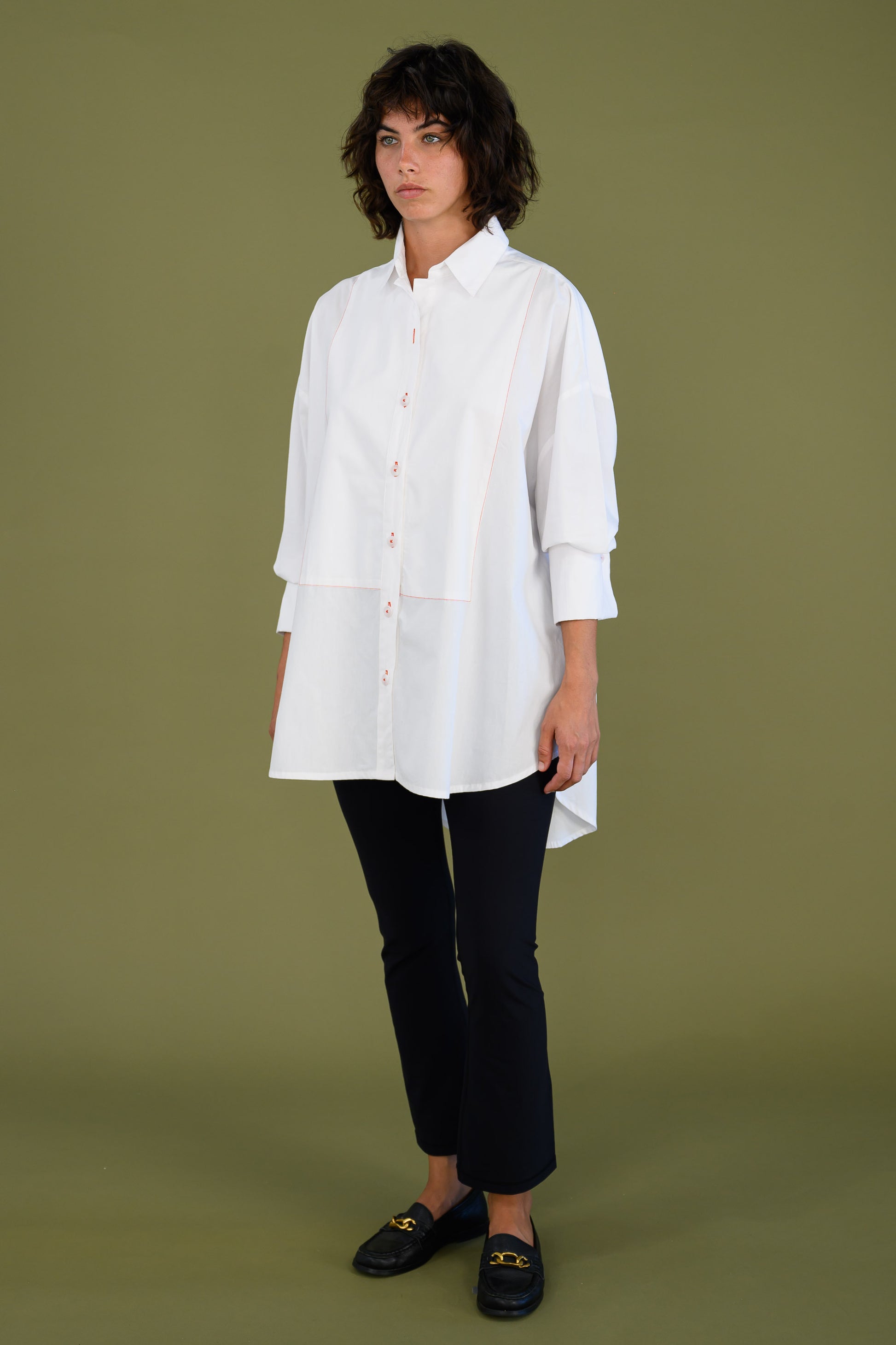 Womens oversized white boyfriend tux shirt in organic cotton poplin styled with slim black pants for a relaxed everyday outfit