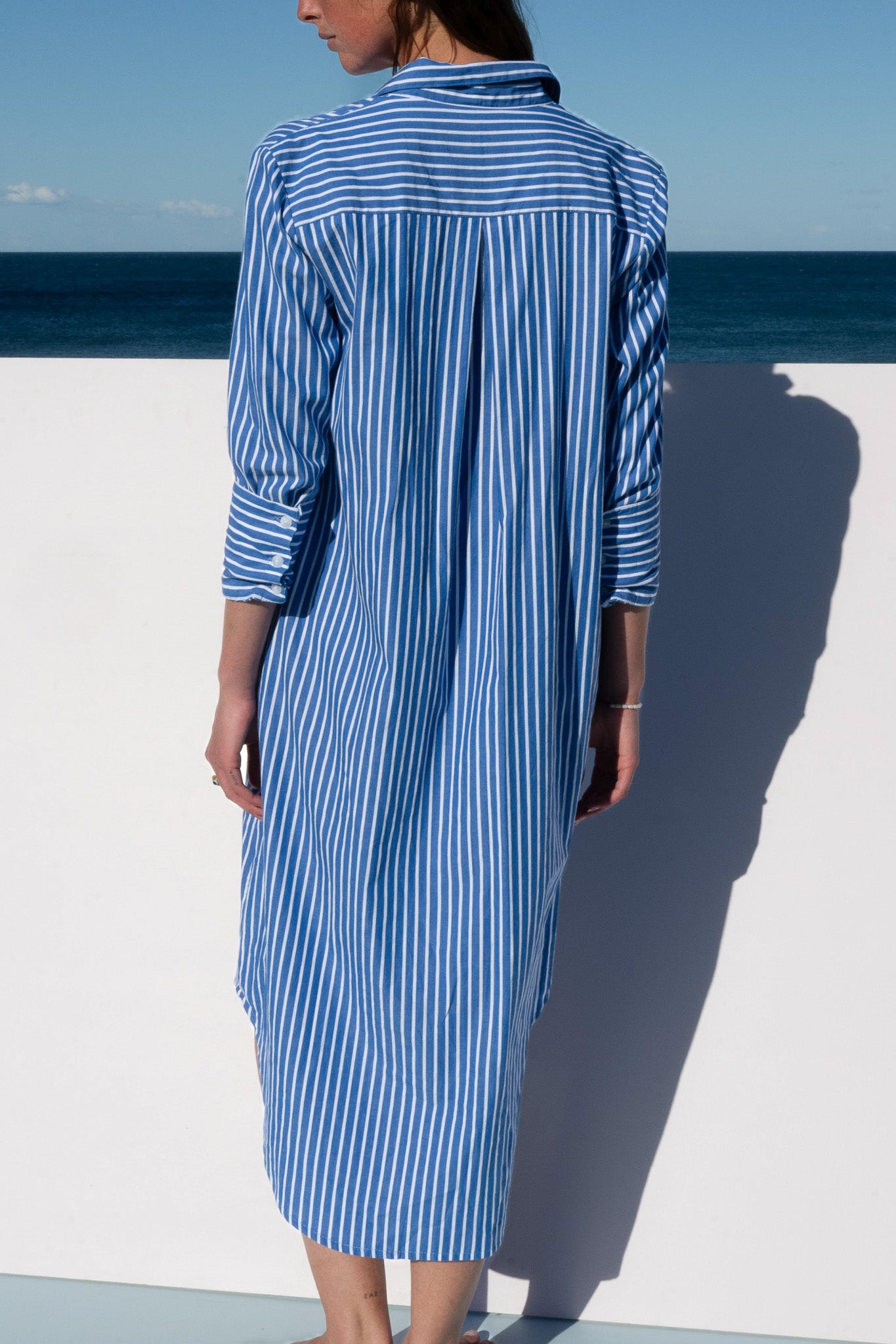 Back view of The Boy & I Bronte Dress in blue and white pinstripe with relaxed fit