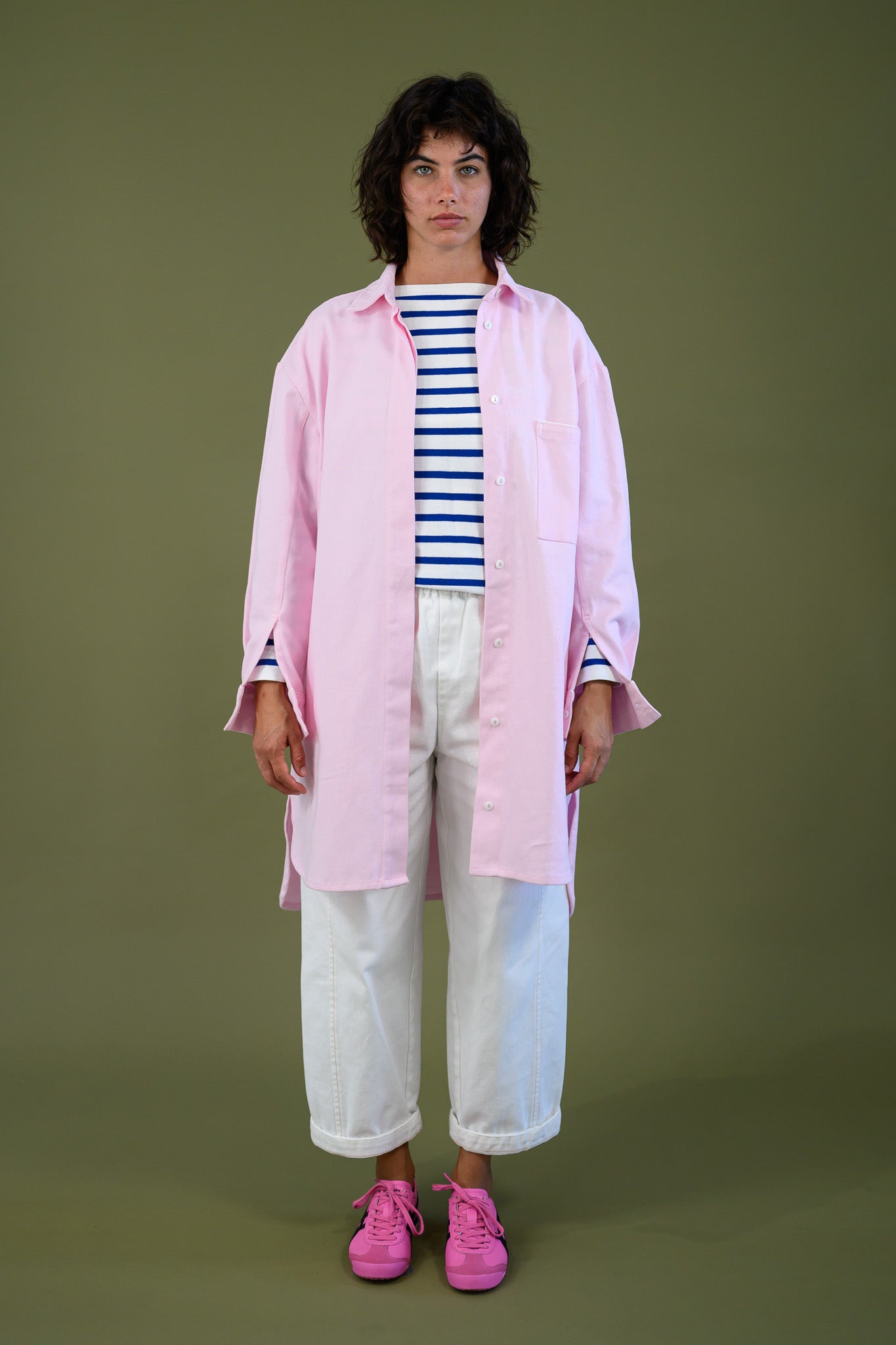 Womens pink canvas denim jacket front view showing relaxed fit longline silhouette