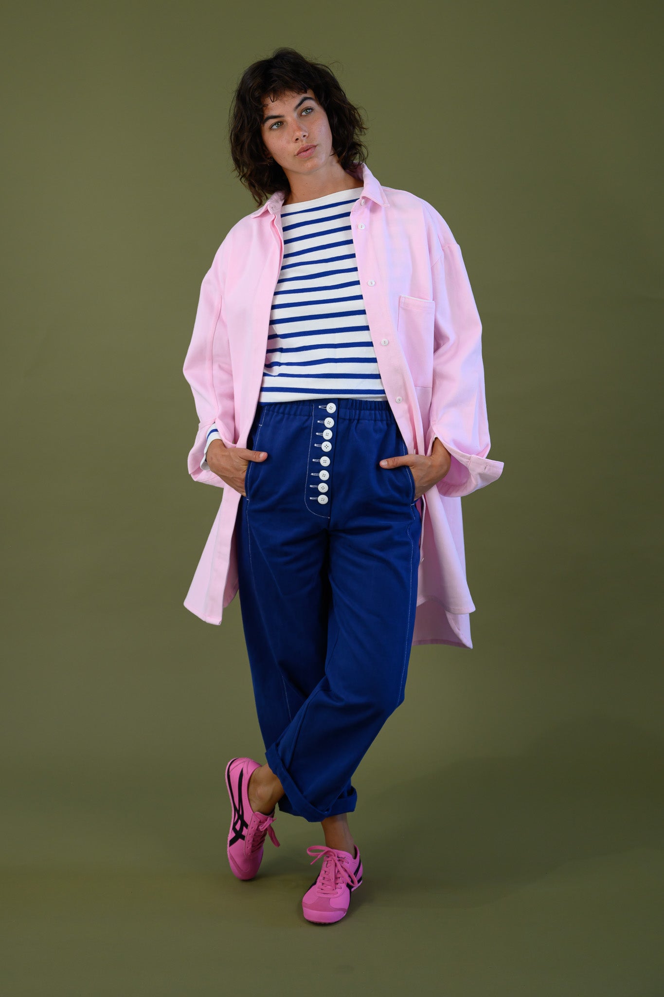 Canvas denim jacket pink womens relaxed fit styled with striped top and blue pants