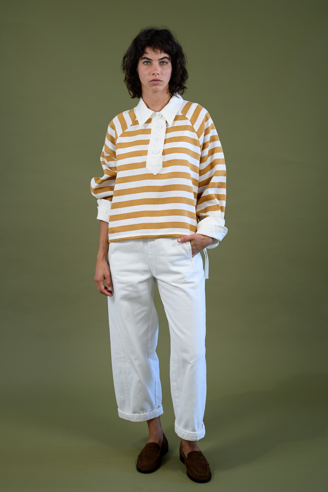 Harrington shirt mango stripe linen full body front view styled with white pants showing relaxed fit, contrast collar and oversized placket detail
