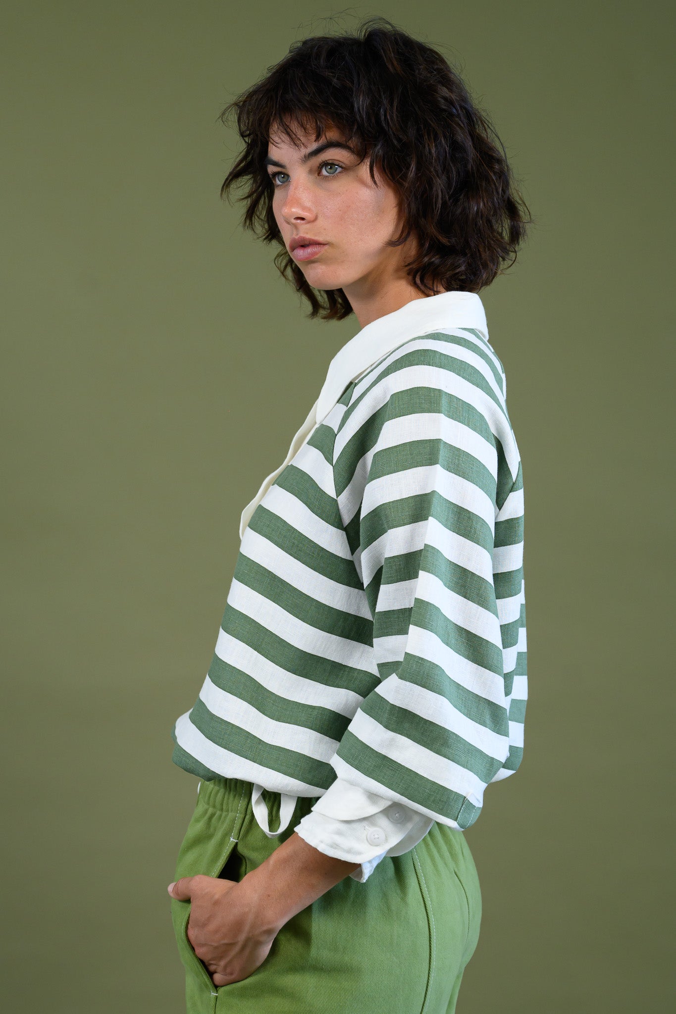 Harrington shirt meadow green stripe linen side view showing relaxed silhouette, sleeve volume and contrast collar detail