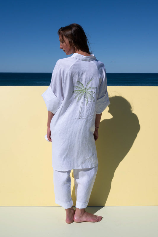 Oceanic Shirt Dress in white linen – straight back view with embroidered palm tree