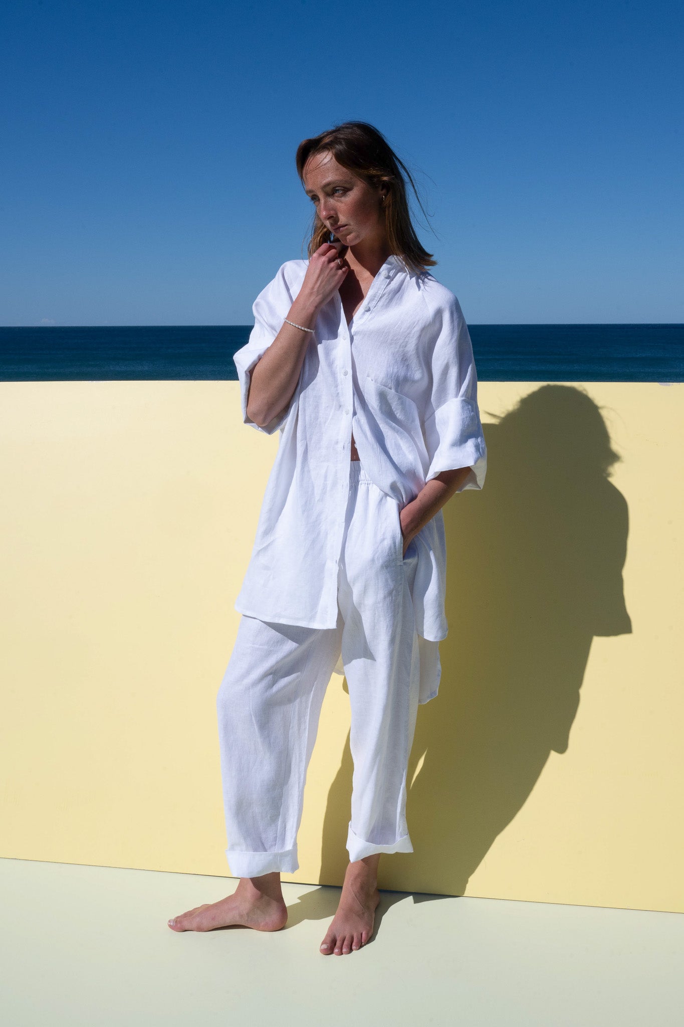 Oceanic Shirt Dress in white linen – relaxed oversized fit styled casually with pants