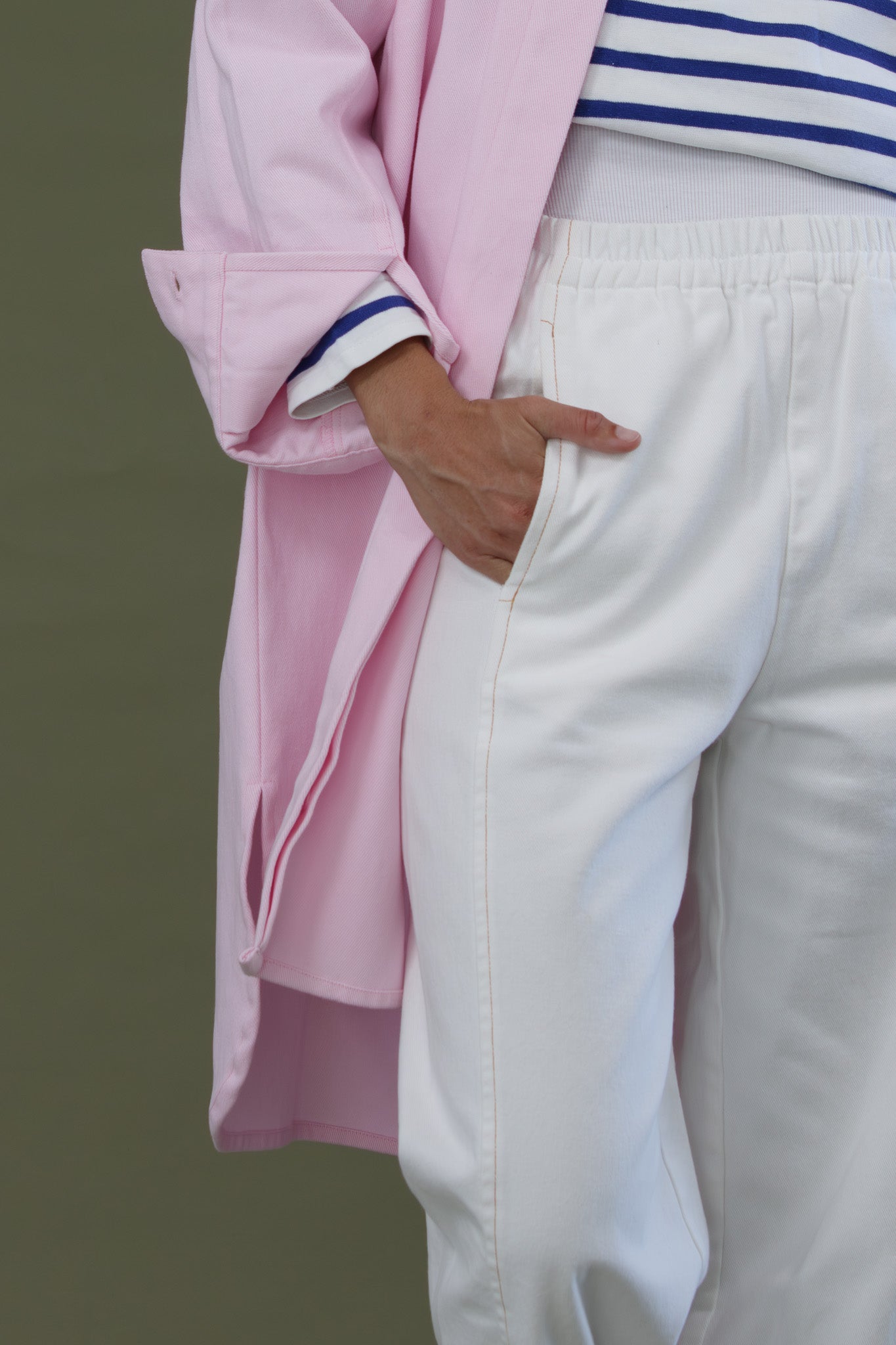 Blaze jogger in white organic cotton twill showing side pocket and relaxed fit detail