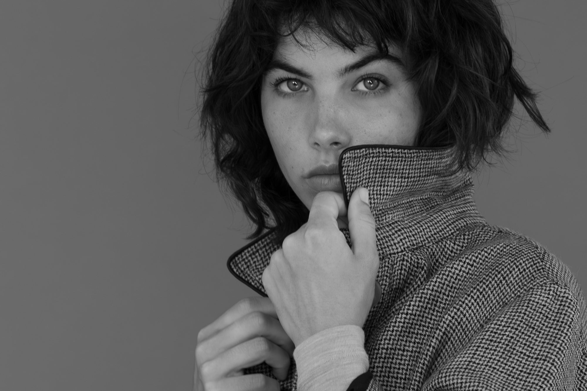 Black and white editorial portrait from The Boy & I FIELD AW26 collection featuring linen outerwear