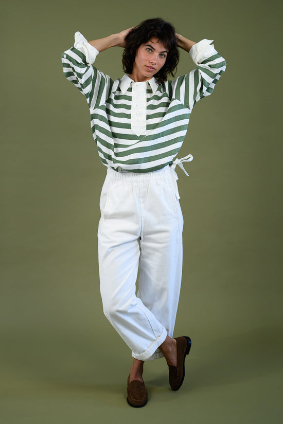 Green stripe Kennedy linen shirt by The Boy & I styled with white Blaze Jogger in relaxed fit cotton