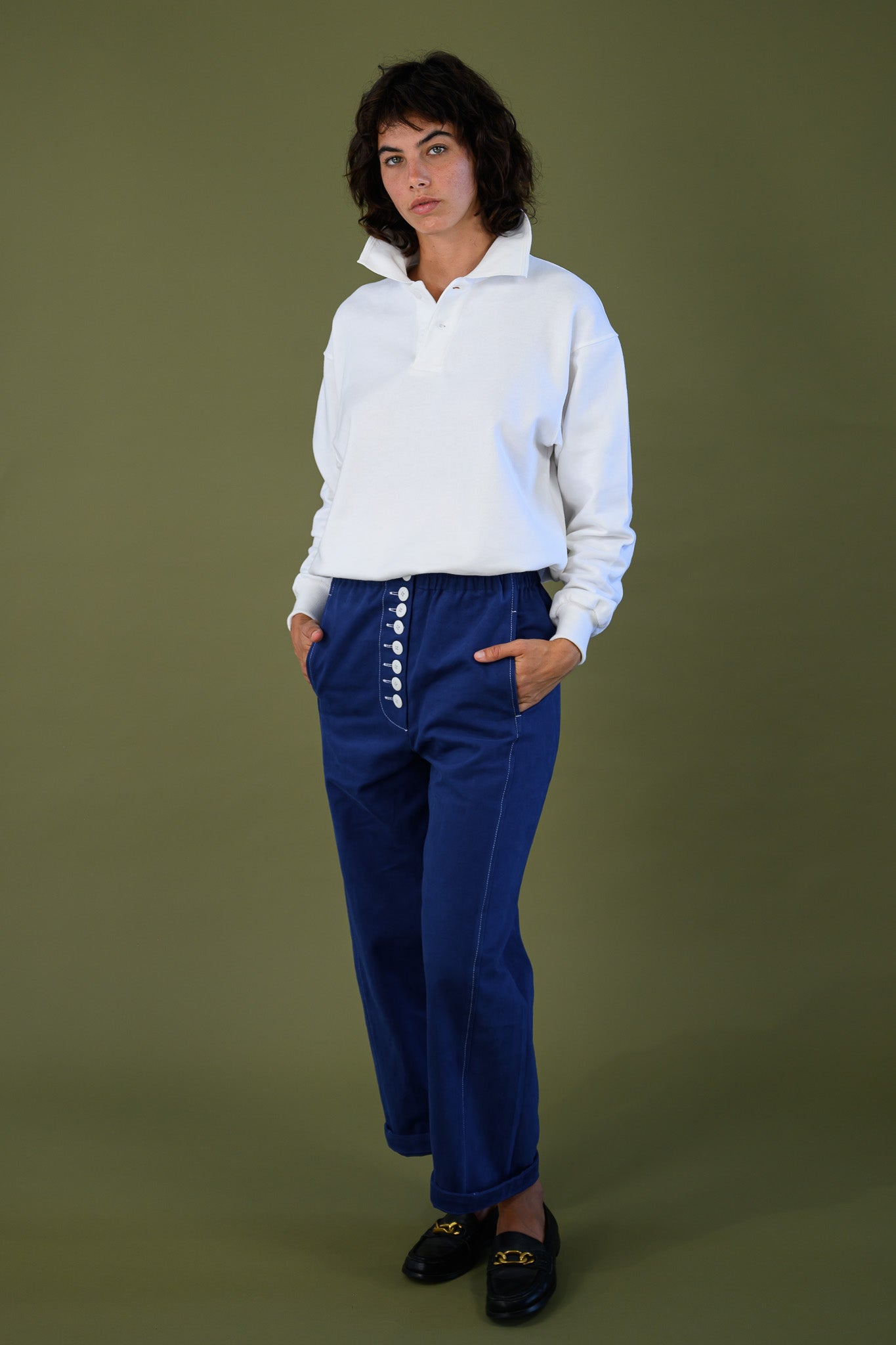 White cotton jumper worn standing showing relaxed everyday fit