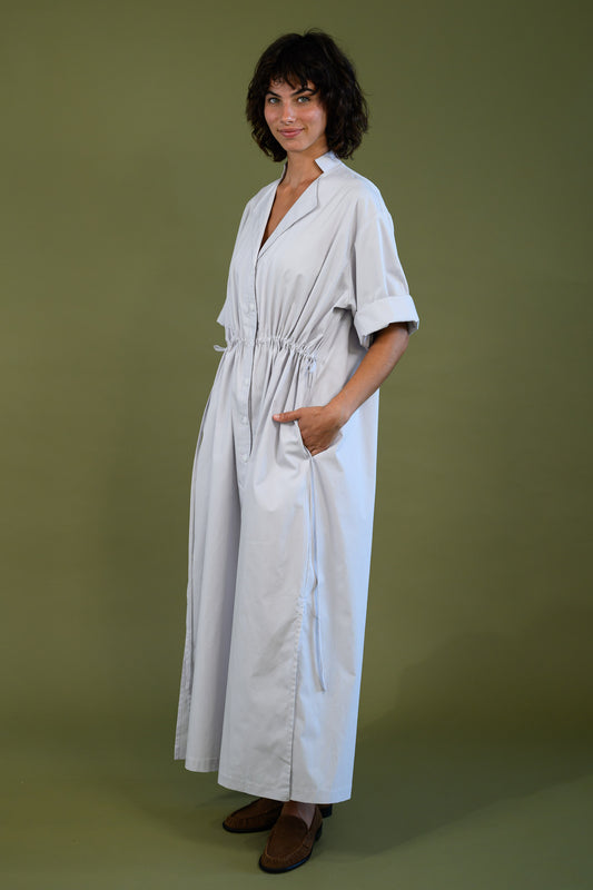 White cotton poplin dress shown full length on model with relaxed fit