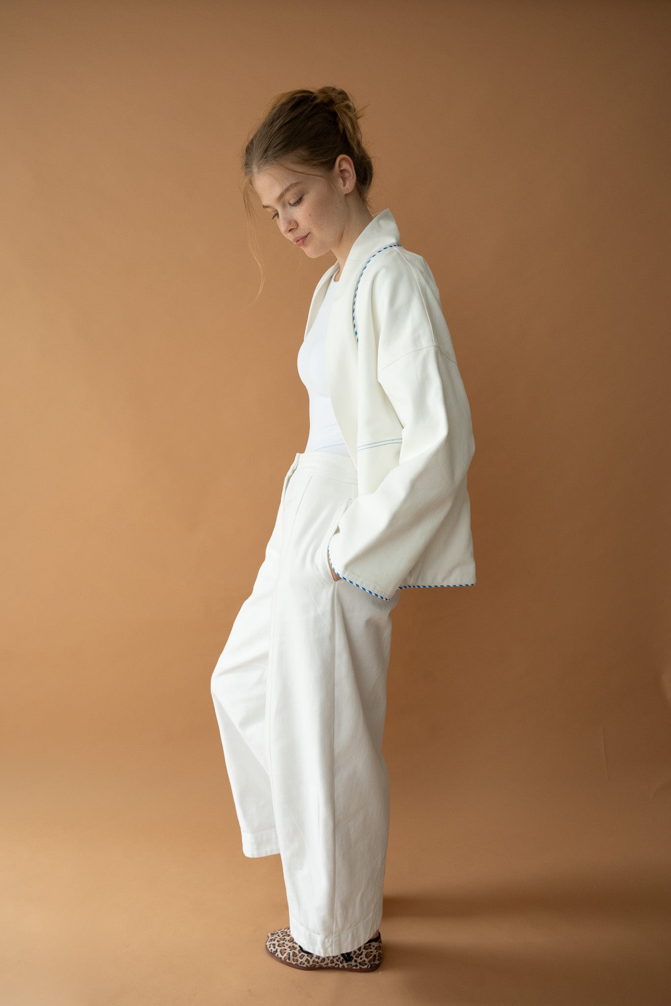 Side profile of Yoko Kimono Shortie in Vanilla Stripe paired with Japandi pants